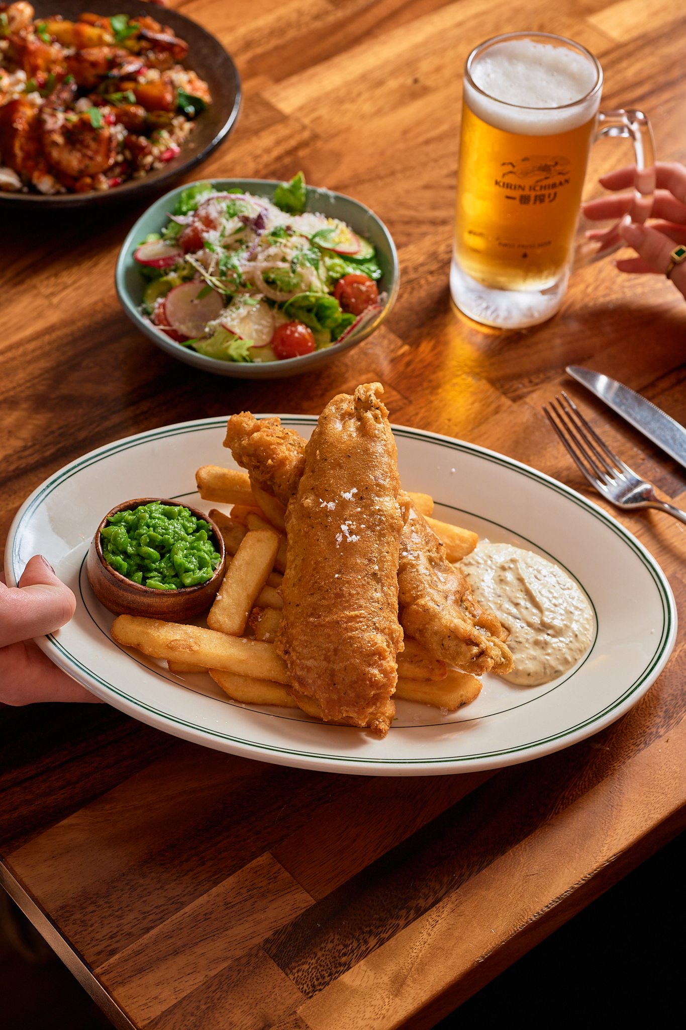 Fish and chips with beer and salad